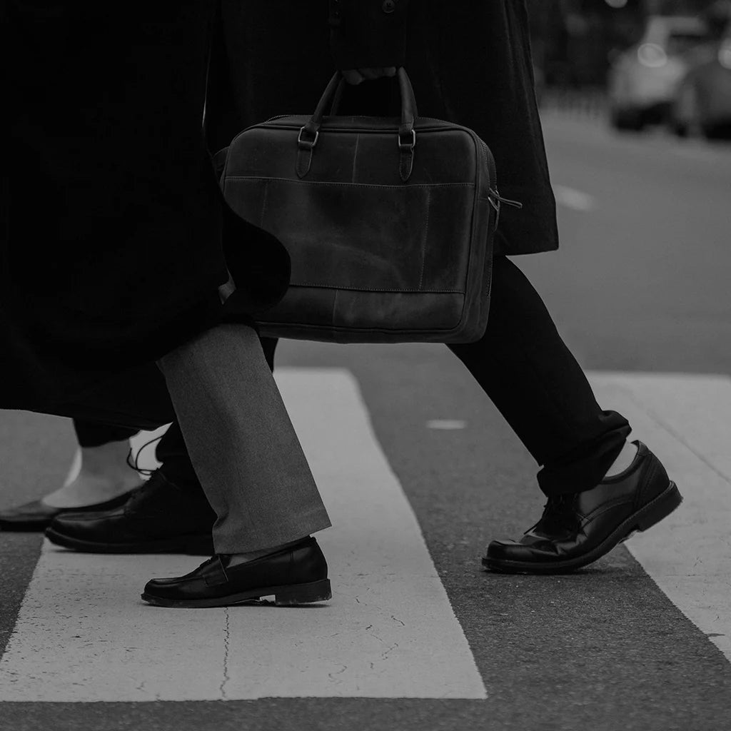 Men walking in designer formal shoes and tailored trousers from the EDRM Men’s Formal Shoes collection, showcasing premium designer clothes and luxury streetwear UK style