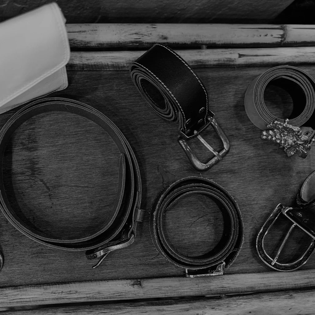 Selection of designer leather belts from the EDRM Men’s Belts collection, showcasing premium designer clothes and authentic designer accessories UK wide