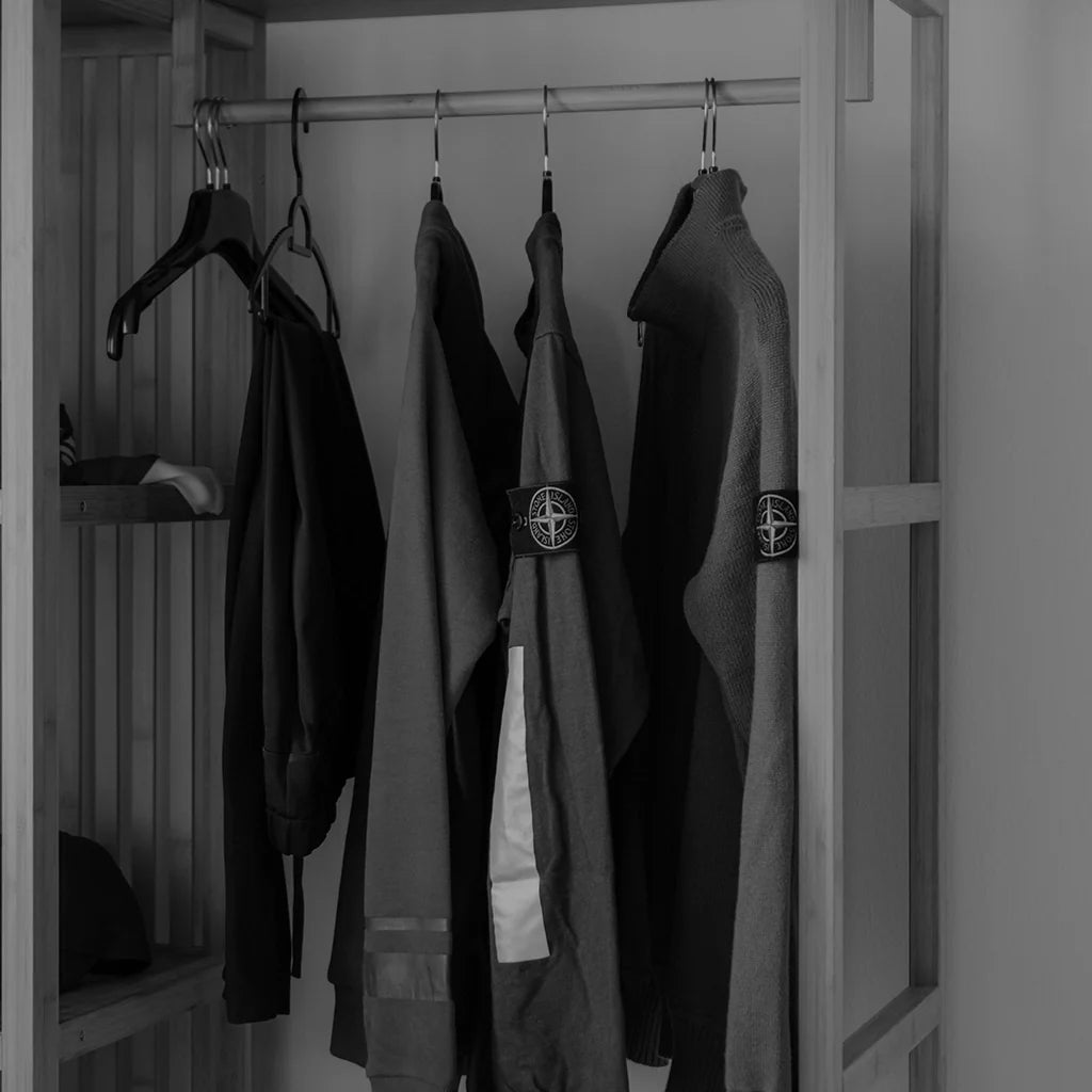Stone Island jackets hanging on rail from the EDRM Stone Island collection, showcasing premium designer clothes and luxury streetwear UK from top UK streetwear brands